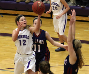 Andy Brown / louisburgsportszone@gmail.com Louisburg senior Natalie Moore drives to the basket for two points during the Jan 30 championship game of the Louisburg Invitational. 