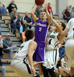 Andy Brown / louisburgsportszone@gmail.com Louisburg guard Sam Guetterman goes up for a shot Tuesday in Paola.