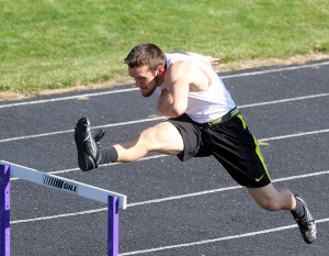 Senior Sean Dennis works on his form in the hurdles. Dennis is a returning state qualifier in the hurdles and 100-meter dash.