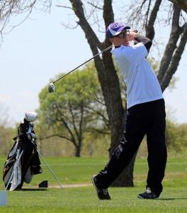 Logan Glenn watches his tee shot during the Osawatomie Invitational on Tuesday at Osawatomie Golf Course.