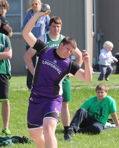 Jarod Woodward rears back for a throw in the shot put Thursday during the Louisburg Invitational. Woodward was second with a throw of 47 feet.