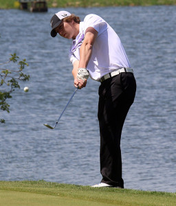 Senior T.J. Smith chips onto the green Monday during the Louisburg Invitational. 
