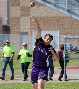 Jarod Woodward releases a throw in the shot put Thursday. Woodward finished with a personal record toss of over 48 feet to take third and qualify for state.