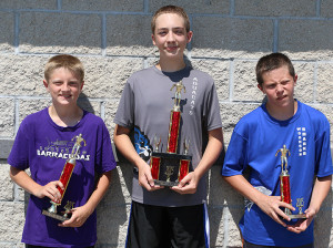 Louisburg's Weston Guetterman (left) was second in the high-point standings for the 11-12 boys.