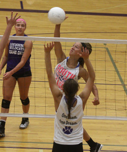 Senior Megan Lemke goes up for a kill attempt on July 16 during the Louisburg volleyball team camp.