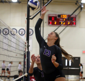 Louisburg senior Cate Stambaugh goes up for a kill during the semifinals of the Frontier League tournament Saturday in Eudora.