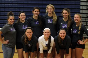 The Louisburg volleyball team pose for a shot after winning the league tournament Saturday. Members of the team (front row, from left) are Megan Lemke, Makenzie Kallevig, Lauren Dunn; (back row) coach Jessica Compliment, Olivia Bradley, Anna Dixon, Madison Turner, Cate Stambaugh and Sophie McMullen.