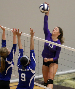 Senior Cate Stambaugh sends a kill over the net Thursday during the Lady Cats home match against Olathe North.