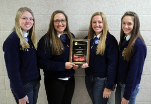 (From left) Megan Eberhart, Ellie Katzer, Abigail Tucker and Kaitlyn Gaza pose with their National FFA Gold Team Award in the Floriculture division. 