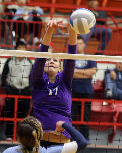 Senior Madison Turner gets a stuff block against Chanute on Friday at the Salina Bicentennial Center.