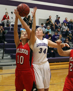 Junior Emalee Overbay goes up for a rebound against Anderson County on Friday.