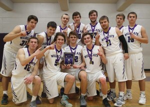 The Louisburg boys basketball team pose with its championship trophy following Friday's win over Baldwin. Members of the team are (front row, from left) Korbin Hankinson, Mitchell McLellan, Grant Harding, Jacob Welsh, Alex Dunn, Dalton Ribordy, Jayce Geiman, Sam Guetterman, Ben Brummel, T.J. Dover, Ben Minster and Jake Hill.