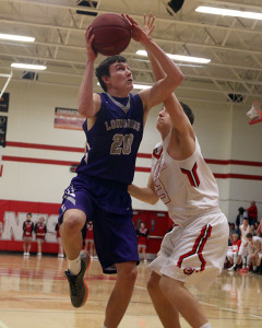 Senior Ben Brummel goes up for a shot and gets fouled during Friday's game in Ottawa.