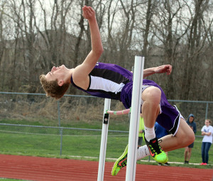 Louisburg junior Andrew Goff clears a mark in the high jump Tuesday at Mill Valley High School. Goff took fourth overall.