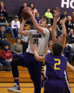 Louisburg's Madden Rutherford drives the lane for a shot during a home game earlier this season.