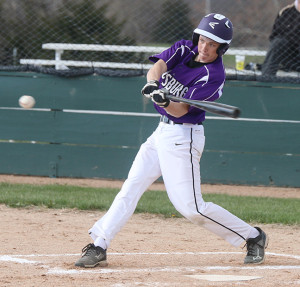 Blake Ruder looks to make contact with a pitch during the Wildcats' season opener against Paola last Thursday. 