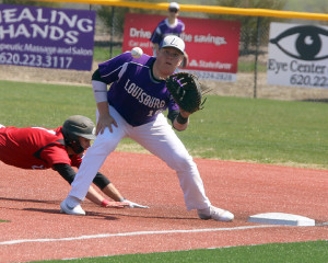 First baseman Austin Henderson looks in a throw as he prepares to tag out an Ottawa runner Saturday in Fort Scott.