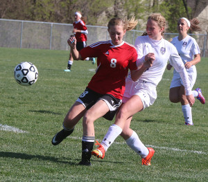 Sophomore Bailey Belcher puts a shot on goal during Monday's contest against Ottawa in Louisburg. 