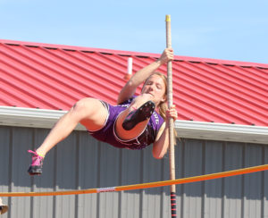 Sophomore Isabelle Holtzen vaults over the bar during the pole vault Thursday at the Anderson County Invitational. Holtzen won the event after she cleared 9-6.