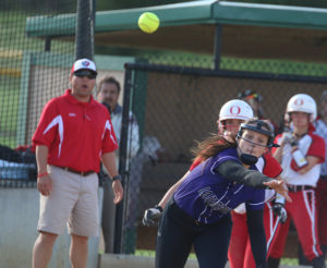 Louisburg third baseman Katie Baker throws out a runner during Tuesday's doubleheader in Ottawa. 