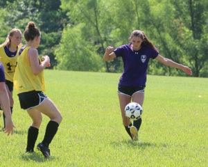 Bria Jensen makes a pass during the team's scrimmage Friday.