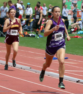 Senior Megan Lemke sprints to the finish in the final leg of the 4x400-meter relay Friday at Wichita State University.