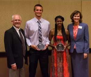 Wyatt Sander (second, from left) receives the Undergraduate Award of Excellence from Emporia State in early May.