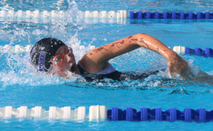 Claire Brown swims the 50-meter freestyle Saturday. Brown won four first-place ribbons.