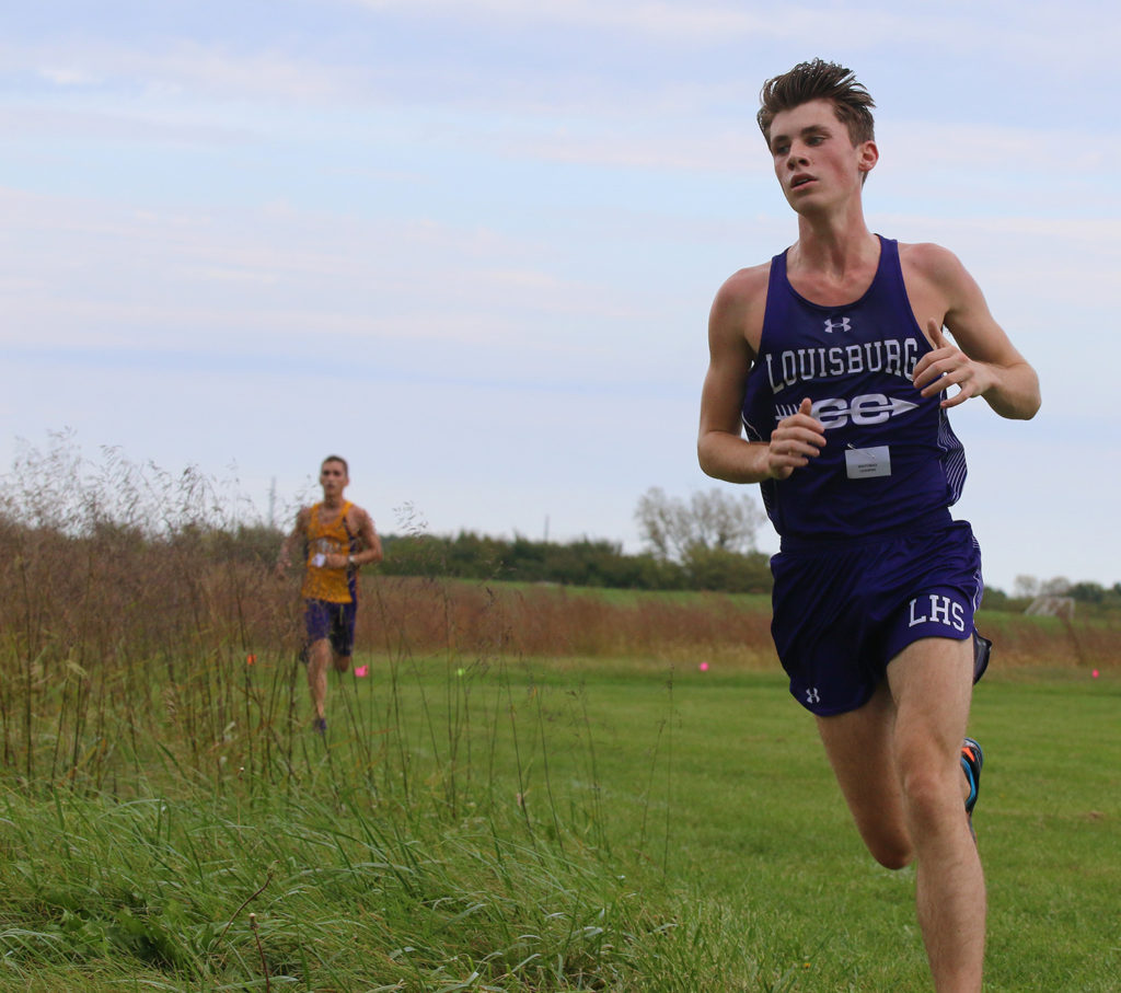 Junior Wyatt Reece turns the corner and heads to the finish line Thursday during the Louisburg Invitational. 